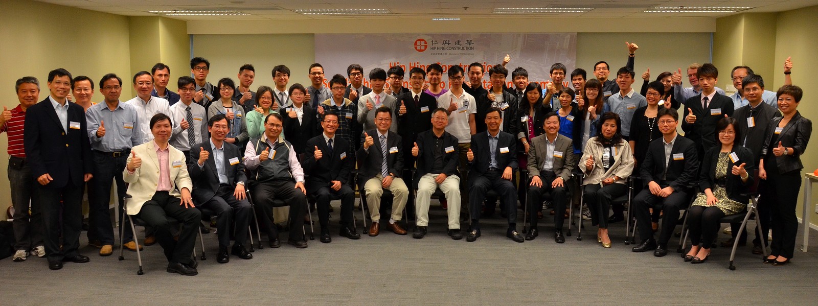 Company representatives and scholars pictured with students from six institutions